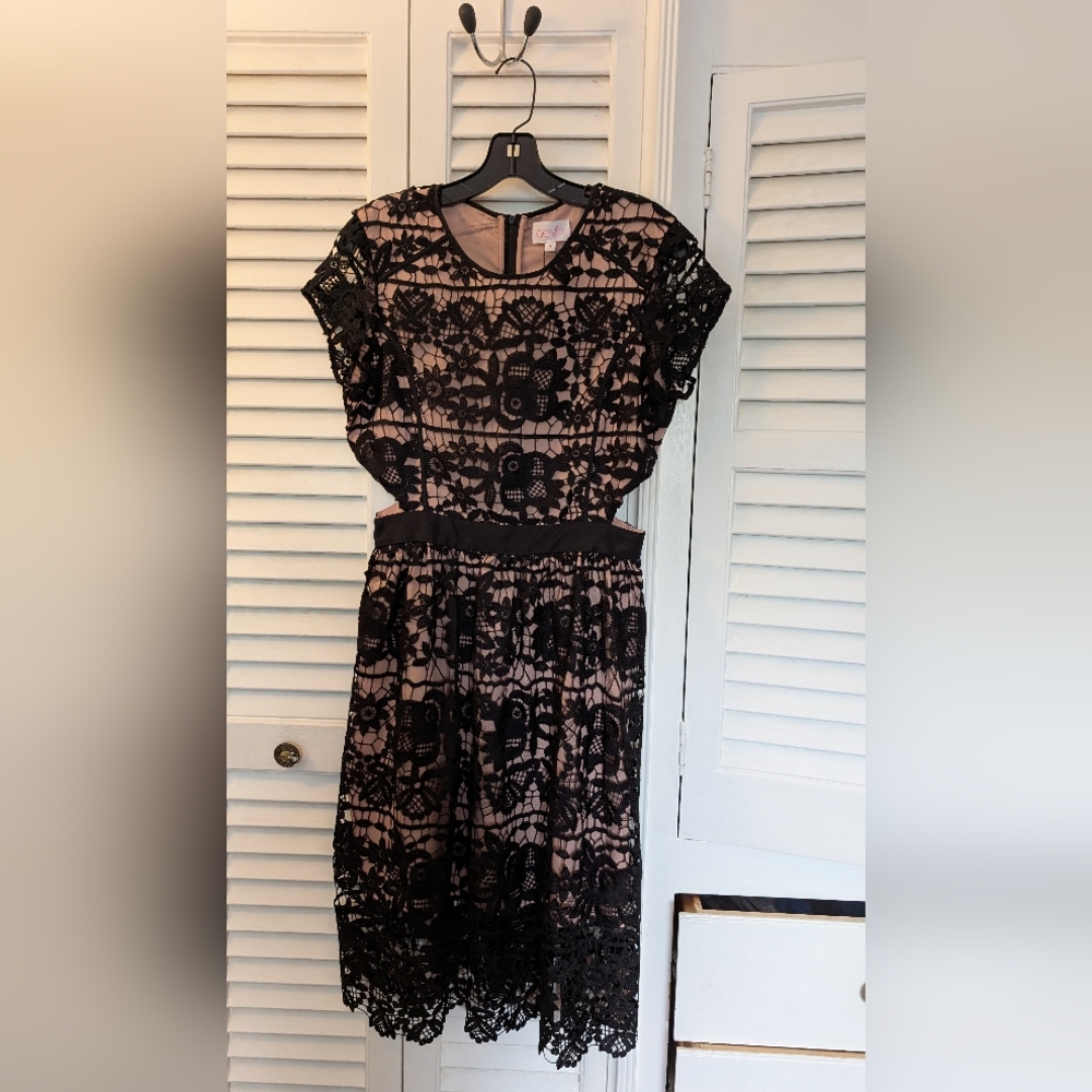 Black Lace Dress With Pink Underlay And Cutout Waist